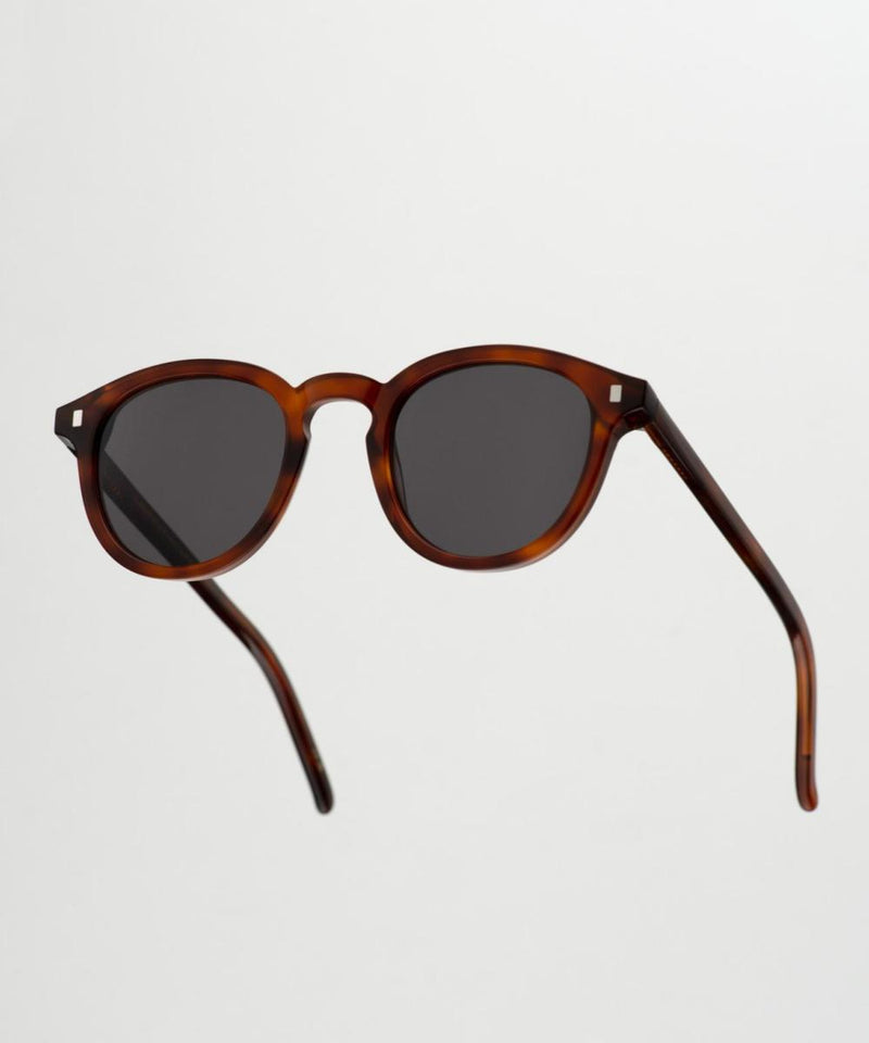 Monokel Zonnebril Nelson Amber-Solid Grey lens